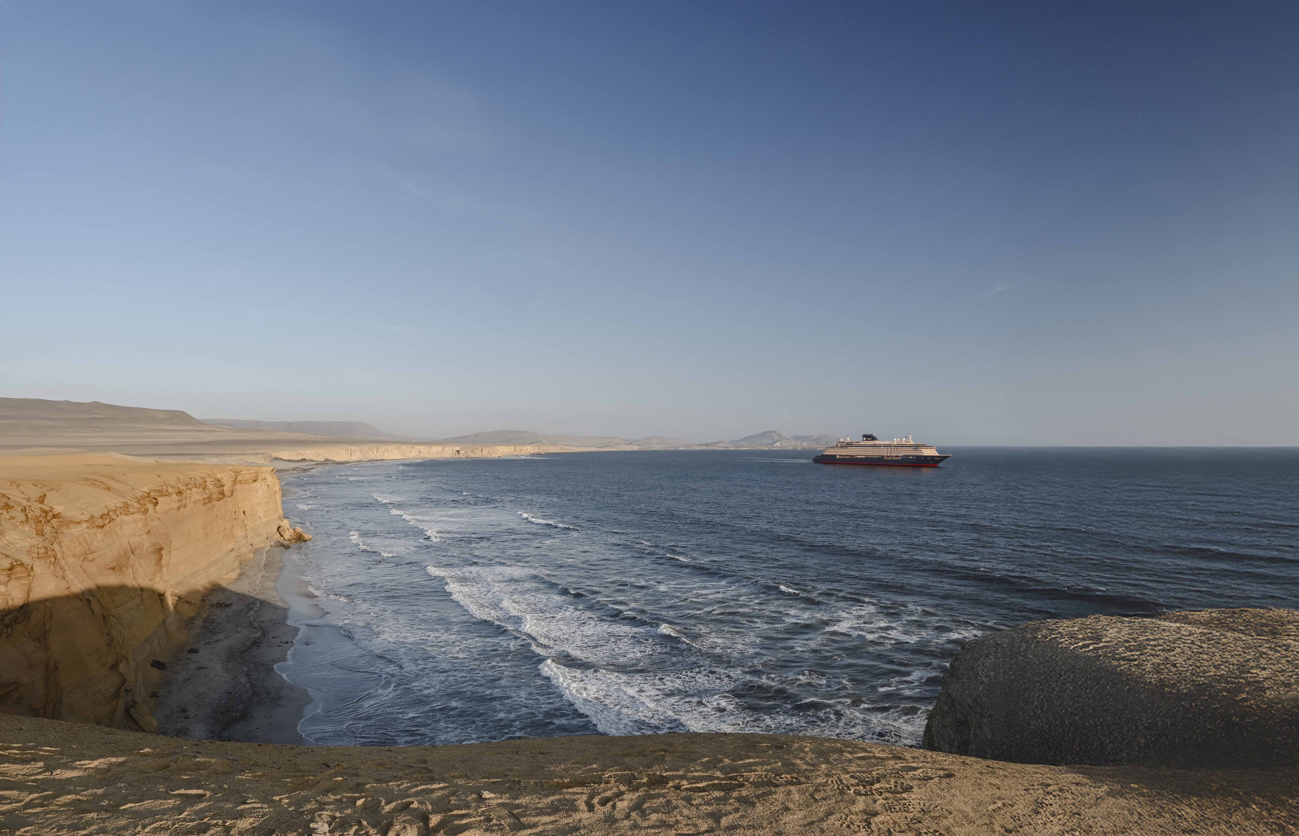 Paragliders Flying Over The Pacific Ocean In Paracas National Reserve At Sunset. Ica, Peru