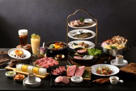 台中七期昭日堂燒肉主打日本A5和牛套餐與桌邊代烤，雙切牛舌、創意料理及紅點建築一次體驗